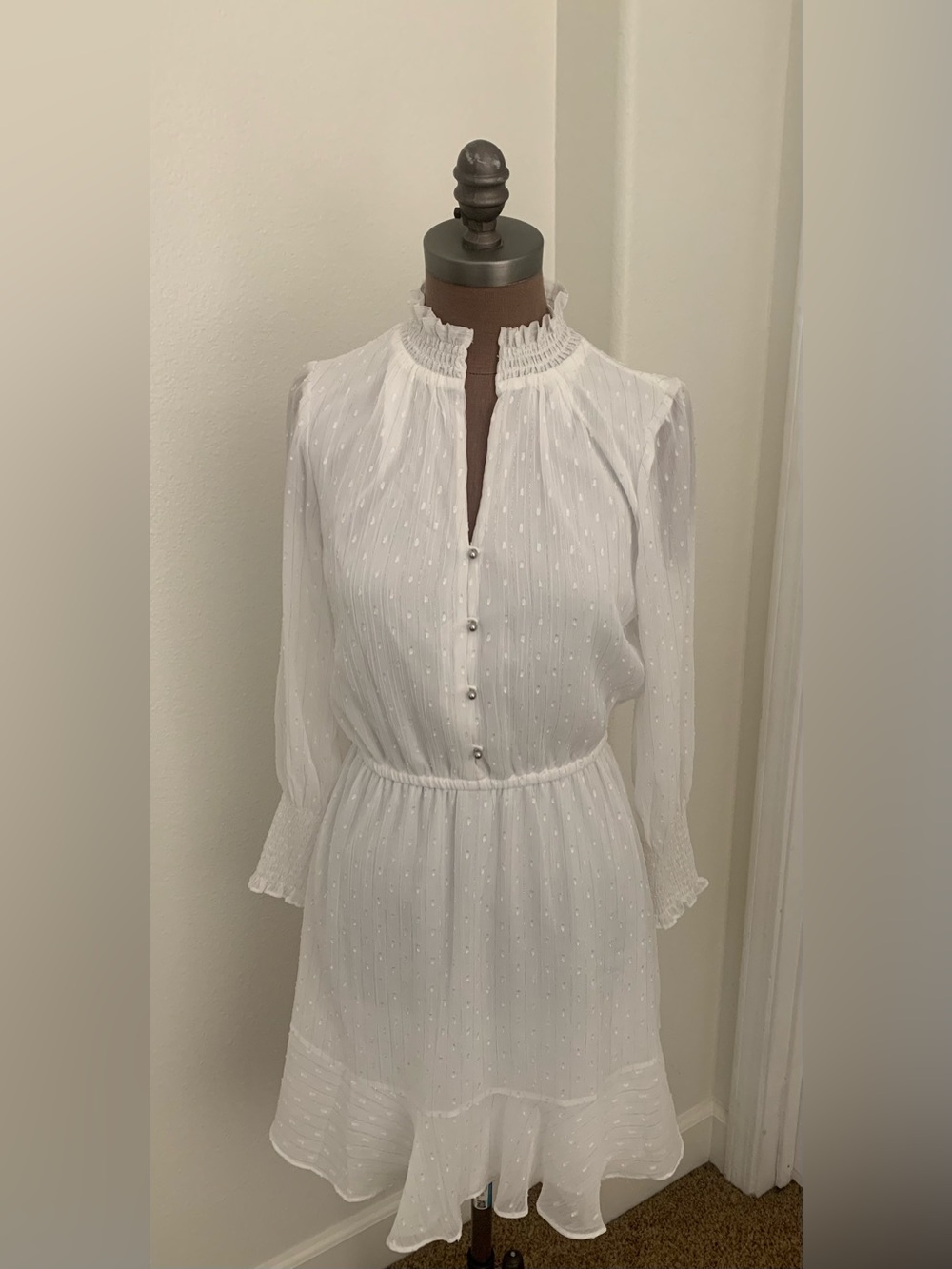 White House Black Market 
White Swiss Dot Long-Sleeve Ruffled Neck Dress